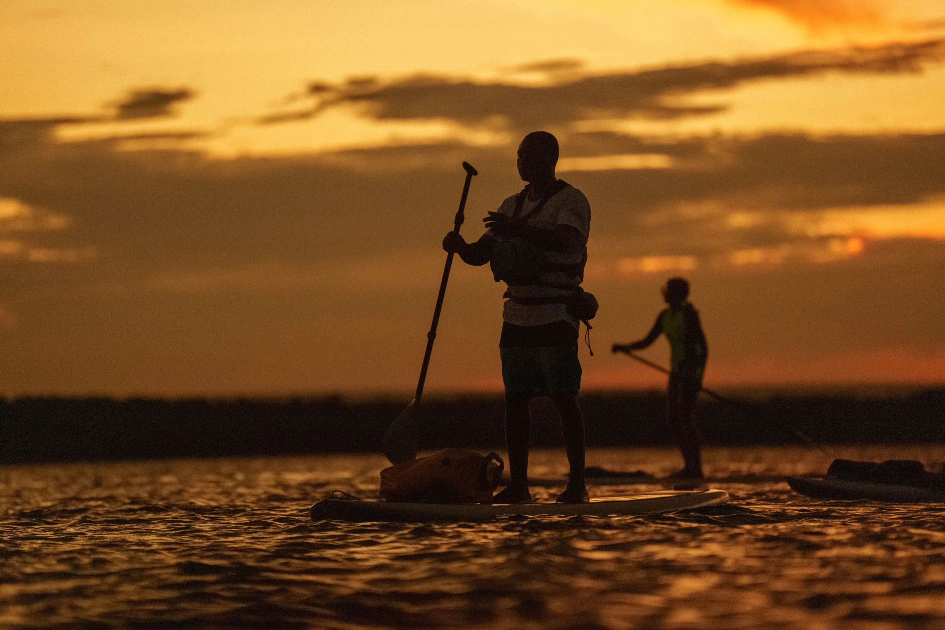 Paddleboarding at sunset