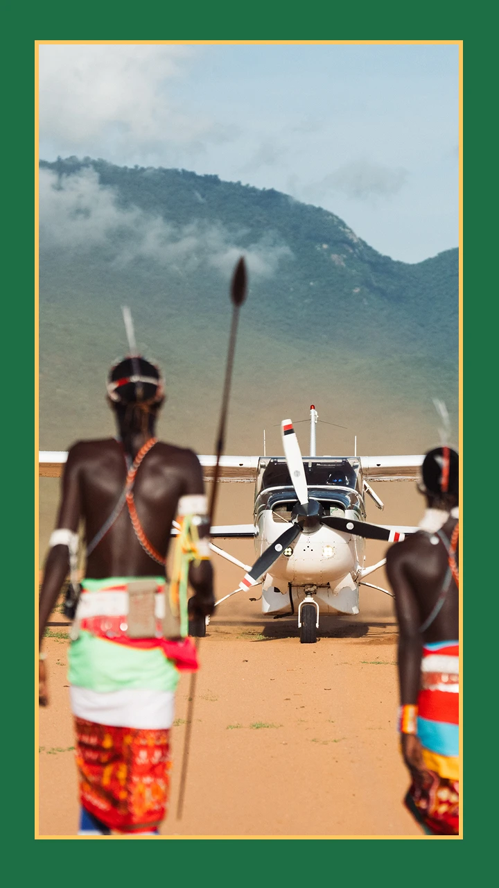 Samuru warriors at landing strip 